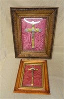 Framed Crucifixes under Convex Glass.