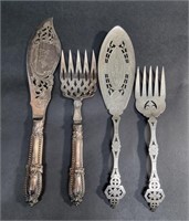 TWO INTRICATELY CRAFTED FISH SERVING SETS