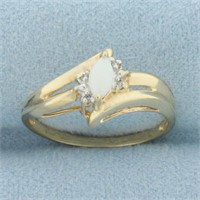 Opal and Diamond Ring in 10k Yellow Gold