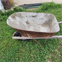 Wheelbarrow - has whole in one side