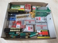 Assortment of ammo includes 12 gauge shells,