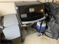 WEBER GENESIS GRILL WITH COVER, KEPT IN GARAGE