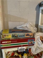 Shelf lot of toys. Rigiduo 9000