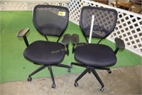 2 black office chairs