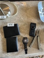 2 Leather Wallets, Wrist Watch, & Leather Man Tool
