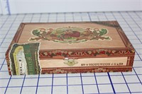 CIGAR BOX WITH SOME COINS AND STAMPS INSIDE