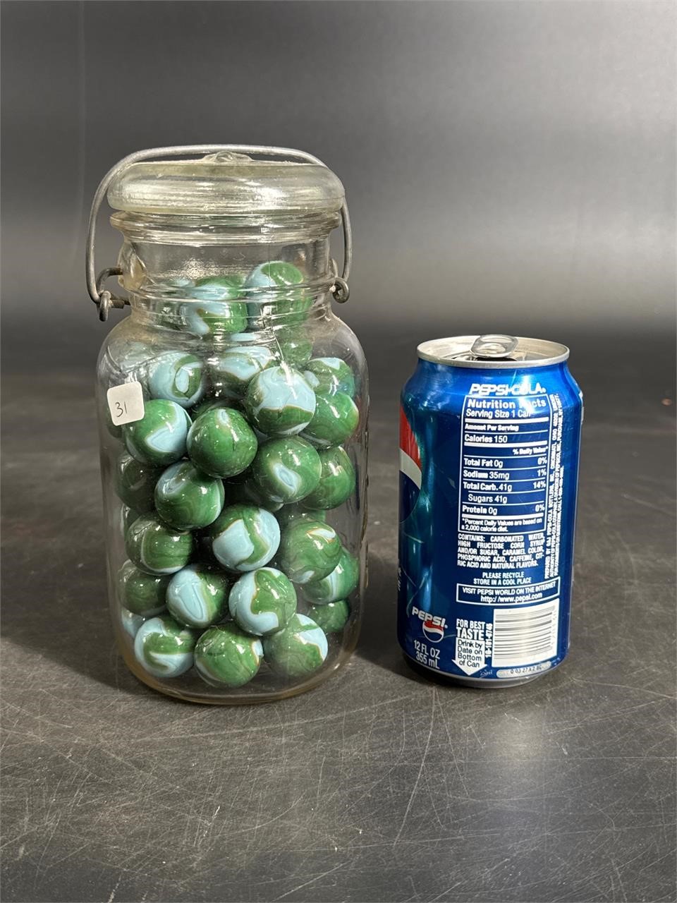 NICE JAR OF VINTAGE SHOOTER SIZE GLASS MARBLES