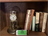 Anniversary clock and nine books