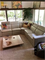 High end, leather sectional with power Recliner