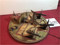 Vintage metal windup toy w/cannons