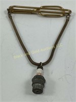 Vintage tie clasp with champion spark plug