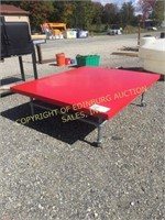 RED METAL TABLE ON WHEELS 4'X5'X18"