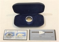 2000 Canadian $2 polar bear stamp & coin.