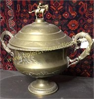 Large brass loving cup with horse etching and