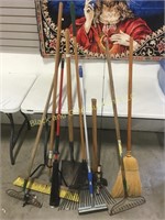 Misc lot of long handled items including an axe