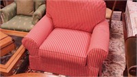 Oversized  upholstered armchair in barn red