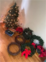 Wreaths and small lighted Christmas tree