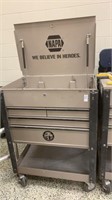 Napa tool box with drawers and open top lid , on