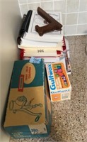 Cookbooks, vintage food grinder