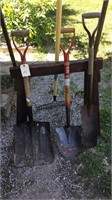 Assorted hand tools, shovels, pitchfork, rake,