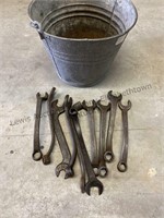 10 vintage wrenches and galvanized bucket