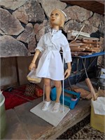 Hand carved wooden nurse.  3' tall.