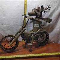 LARGE METAL DOG ON MOTORCYCLE APROX 17" TALL