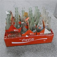 Glass Coke Bottles in Plastic Carrier