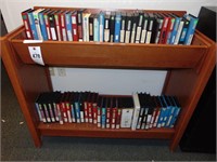 wooden shelf with vhs tapes