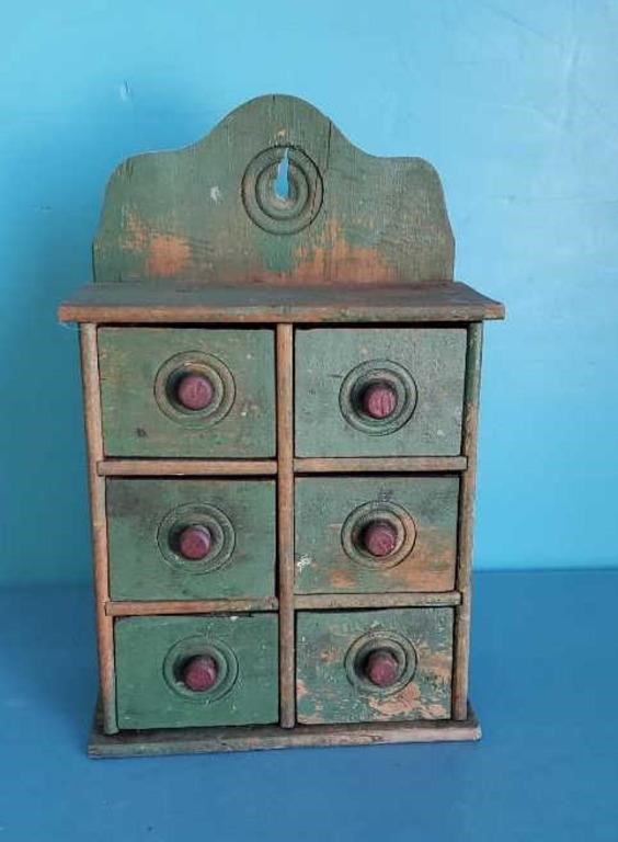 Antique hanging green spice cabinet