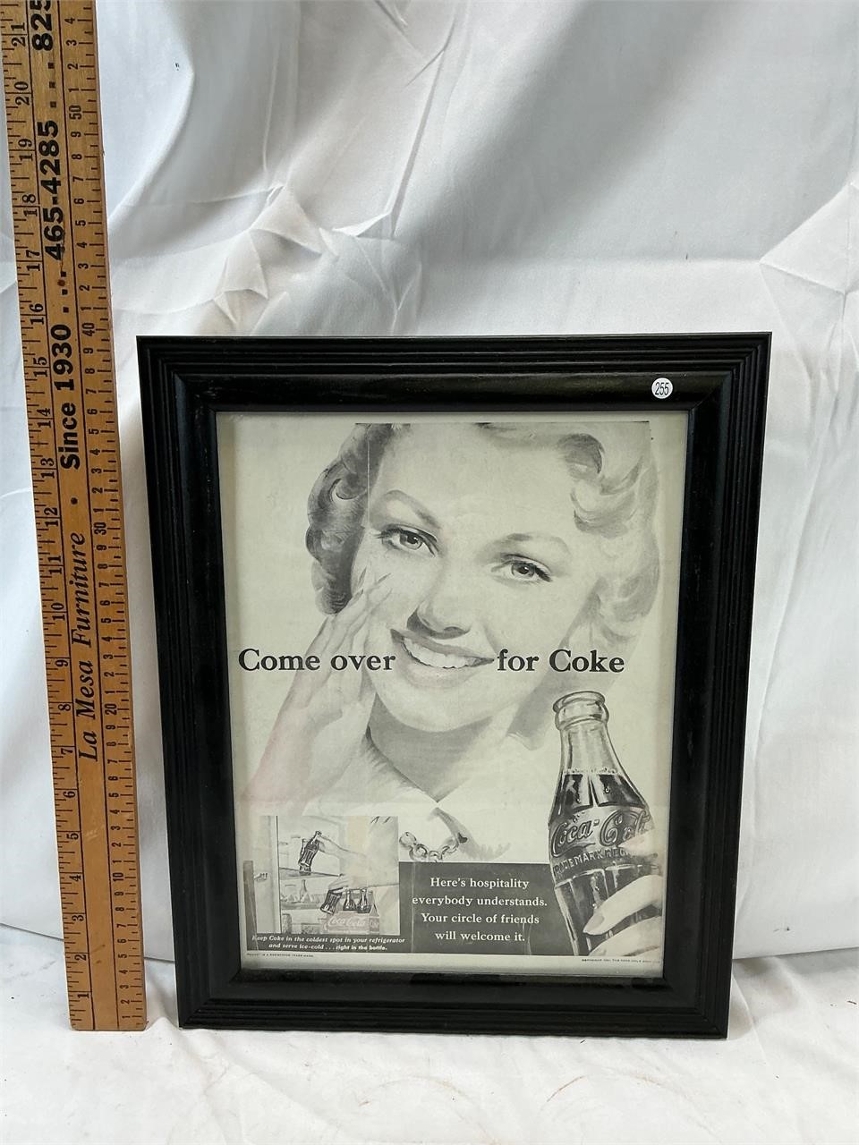 Framed Coca Cola Advertisement