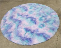 2 round rugs- fuzzy purple,pink,bluish green and
