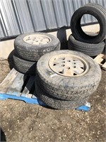 Four LT225/75R16 tires on rims