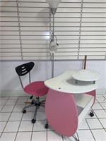 Kids pink desk, pink chair, and white floor light