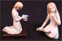 Two Cybis figurines including little girl holding