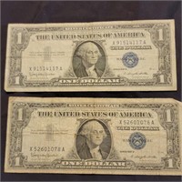 Two 1957 silver one dollar certificates look at