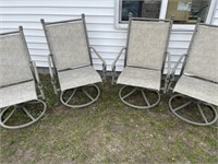 Set of four lawn chairs spinning