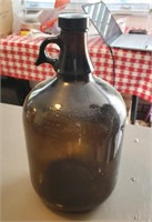 One gallon brown jug