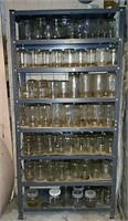 Canning jars & shelving unit.