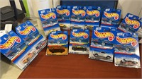 12 New Hot wheels New on card.  Including  1-4.