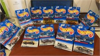 12 New Hot wheels new on card includes 1-4 Seein’