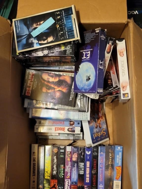 box of VHS tapes