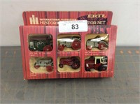 Ertl IH historical toy tractor set