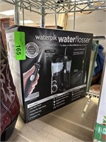 NEW WATERPIK WATERFLOSSER