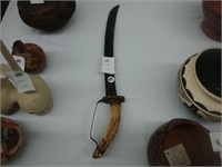 Primitive bone handles dagger or sword.