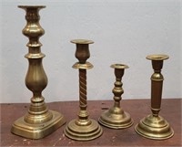 4 antique brass candlesticks