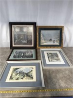 Framed artwork of European towns and landmarks,