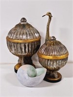 Lidded orbs, bird statue, shell