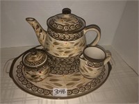 Temp-tations teapot,cream, sugar, and platter