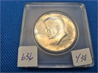 1-1964 USA UNCIRCULATED 50 CENT COIN IN PLASTIC